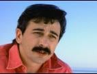 Clip Aaron Tippin - I Wonder How Far It Is Over You